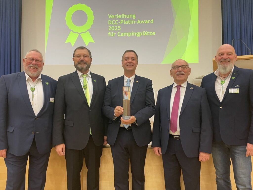 Recognition of excellence: João Alves Pereira receives the DCC Platin-Award 2025 in Germany, a tribute to his leadership, resilience, and unwavering dedication to international camping.
